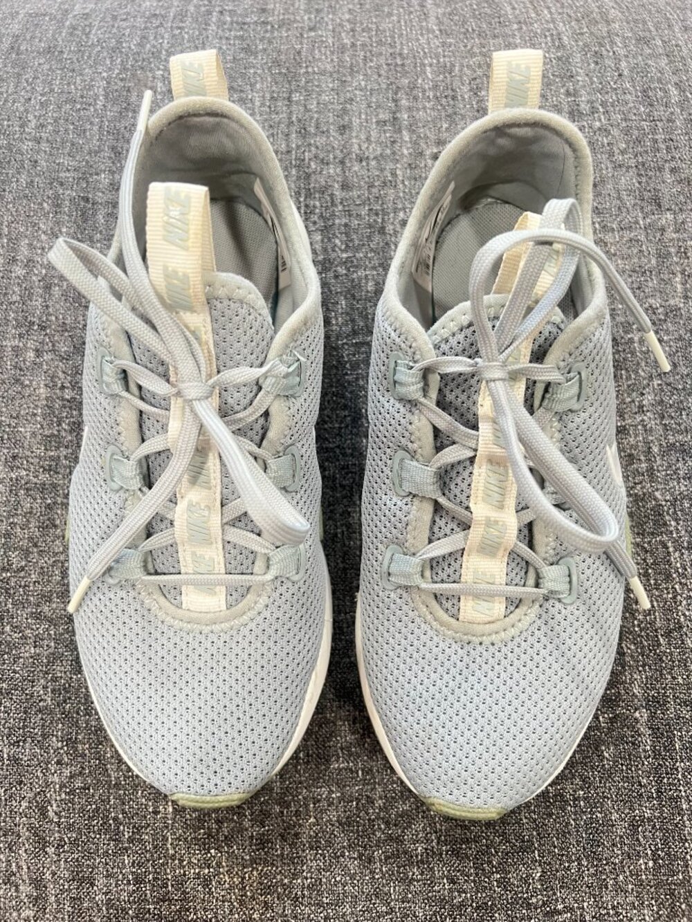 Nike Women sneakers gray and white size 5.